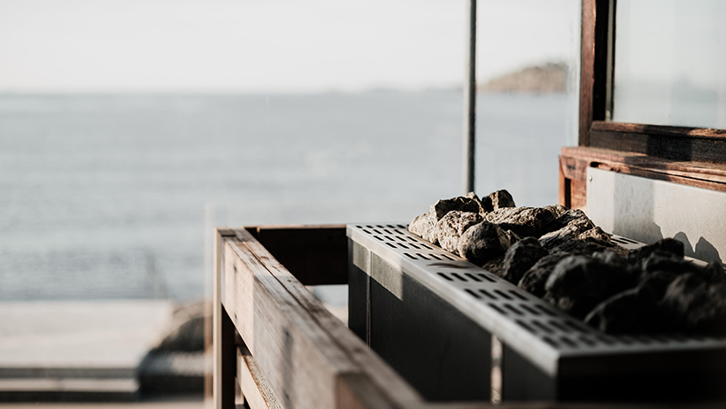 badstue ovn i Sauna med utsikt over sjøen